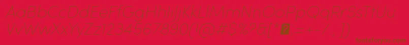 Fonte SofiaProUltralightItalic – fontes marrons em um fundo vermelho