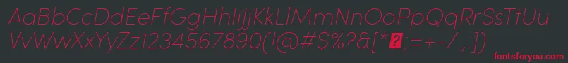 Fonte SofiaProUltralightItalic – fontes vermelhas em um fundo preto