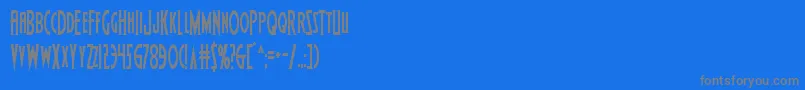 Wolfsbane2cond-fontti – harmaat kirjasimet sinisellä taustalla