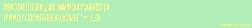 Czcionka Wolfsbane2cond – żółte czcionki na zielonym tle