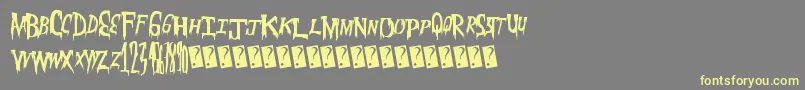 Meatmarket Font – Yellow Fonts on Gray Background