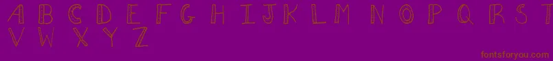 En savoir plus sur la police Aezdots Police Aezdots – polices brunes sur fond violet