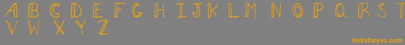 Aezdots Font – Orange Fonts on Gray Background
