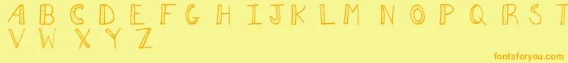 Aezdots Font – Orange Fonts on Yellow Background