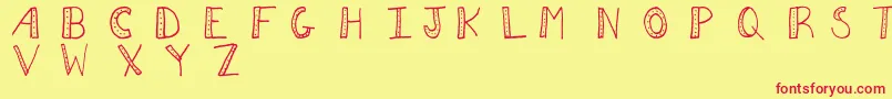 Aezdots Font – Red Fonts on Yellow Background