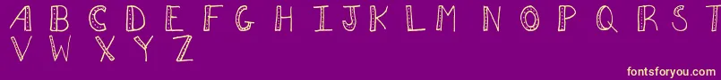 Aezdots Font – Yellow Fonts on Purple Background