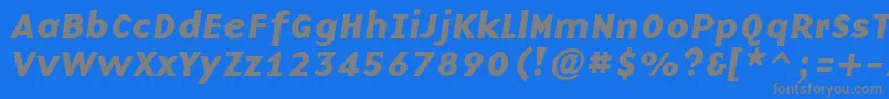 フォントBaseninecBolditalic – 青い背景に灰色の文字