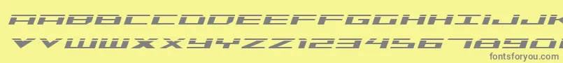 フォントTriremelaserital – 黄色の背景に灰色の文字