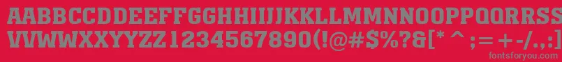 フォントAMonumentotitulBold – 赤い背景に灰色の文字