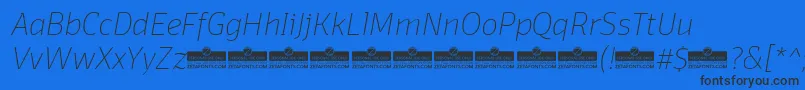 DomotikaThinItalicTrial Font – Black Fonts on Blue Background