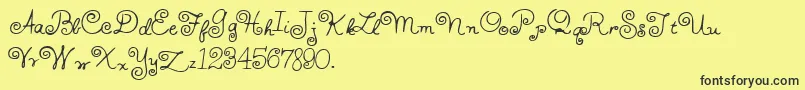 Fonte HffWhirlyWhorl – fontes pretas em um fundo amarelo