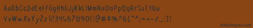 DraftingTable Font – Black Fonts on Brown Background
