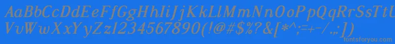 DustismoRomanItalicBold-fontti – harmaat kirjasimet sinisellä taustalla