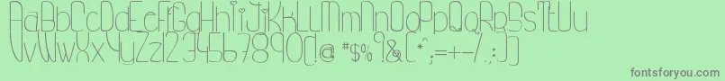 MyPrincessLikeAFrog Font – Gray Fonts on Green Background