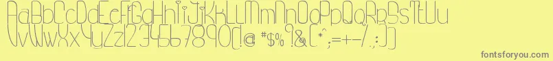 MyPrincessLikeAFrog Font – Gray Fonts on Yellow Background