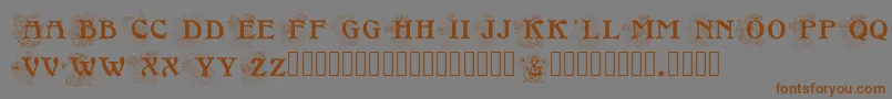 Floralcapsnouveau Font – Brown Fonts on Gray Background