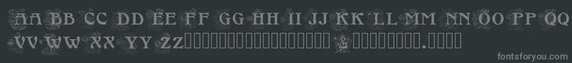 フォントFloralcapsnouveau – 黒い背景に灰色の文字