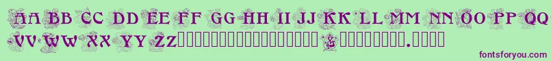 Floralcapsnouveau Font – Purple Fonts on Green Background