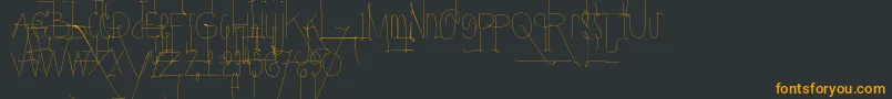 フォントYolasm – 黒い背景にオレンジの文字