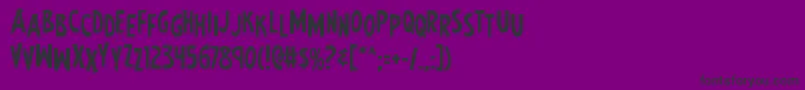 Earthsmightiestjumble-fontti – mustat fontit violetilla taustalla