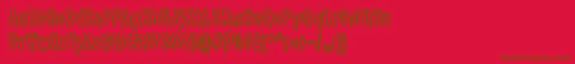 ItLivesInTheSwampBrk-Schriftart – Braune Schriften auf rotem Hintergrund
