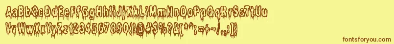ItLivesInTheSwampBrk-Schriftart – Braune Schriften auf gelbem Hintergrund