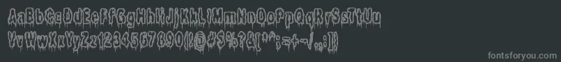 フォントItLivesInTheSwampBrk – 黒い背景に灰色の文字