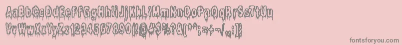 フォントItLivesInTheSwampBrk – ピンクの背景に灰色の文字