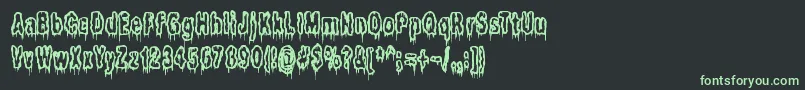 フォントItLivesInTheSwampBrk – 黒い背景に緑の文字