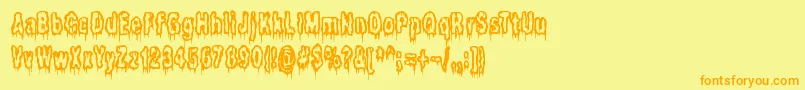 フォントItLivesInTheSwampBrk – オレンジの文字が黄色の背景にあります。