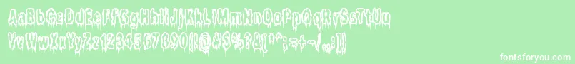 フォントItLivesInTheSwampBrk – 緑の背景に白い文字