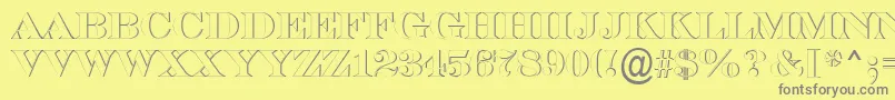 フォントASerifertitulsh – 黄色の背景に灰色の文字