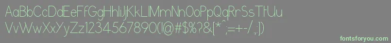 GrutchgroteskCondensedlight Font – Green Fonts on Gray Background