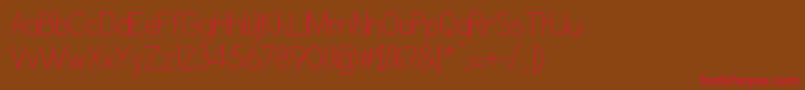 GrutchgroteskCondensedlight Font – Red Fonts on Brown Background