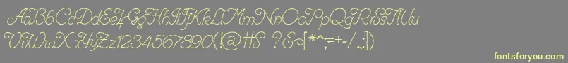 RenaniaTrash Font – Yellow Fonts on Gray Background