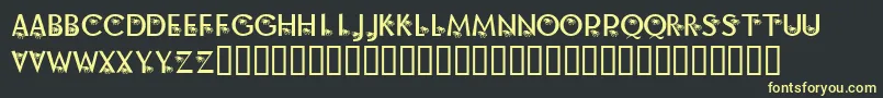 KrAlongCameASpider Font – Yellow Fonts on Black Background