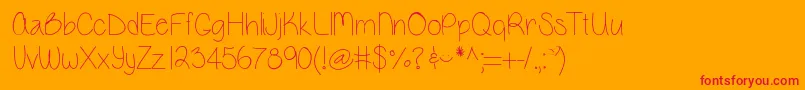 Vanessamarie-Schriftart – Rote Schriften auf orangefarbenem Hintergrund