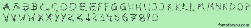 フォントHotsblots – 緑の背景に黒い文字