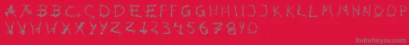 Hotsblots-fontti – harmaat kirjasimet punaisella taustalla