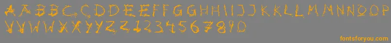 フォントHotsblots – オレンジの文字は灰色の背景にあります。