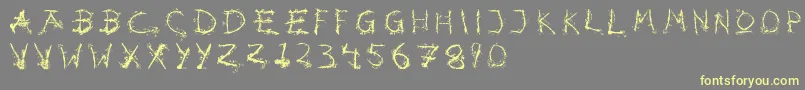 Hotsblots-Schriftart – Gelbe Schriften auf grauem Hintergrund