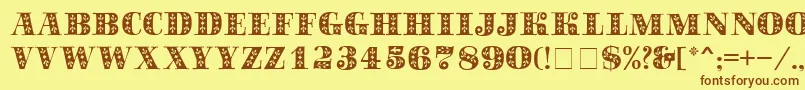 フォントSapphireСЃ – 茶色の文字が黄色の背景にあります。