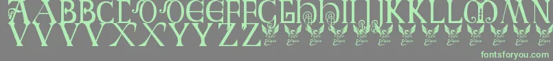 BritishBlockFlourish10thC Font – Green Fonts on Gray Background
