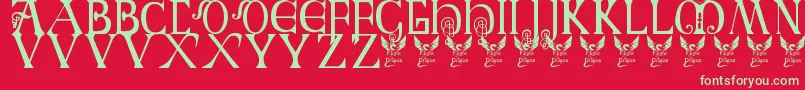 BritishBlockFlourish10thC Font – Green Fonts on Red Background