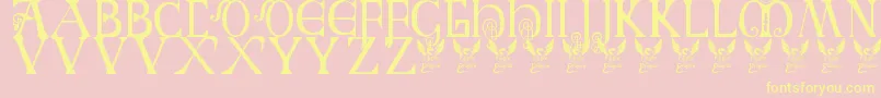 BritishBlockFlourish10thC-Schriftart – Gelbe Schriften auf rosa Hintergrund