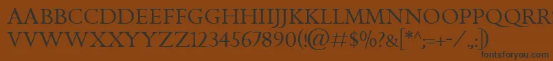 フォントGoldenCockerelTitlingItc – 黒い文字が茶色の背景にあります