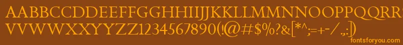 GoldenCockerelTitlingItc-Schriftart – Orangefarbene Schriften auf braunem Hintergrund