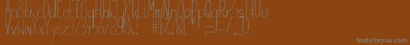 Шрифт Giraffenhals – серые шрифты на коричневом фоне