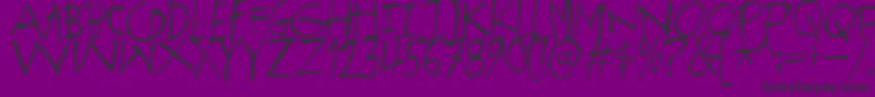 Fonte SpektakelDemo – fontes pretas em um fundo violeta