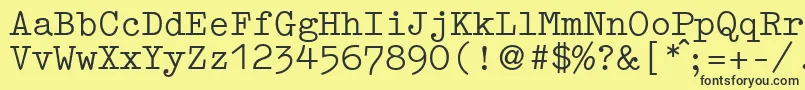 フォントGermantypewriterRegular – 黒い文字の黄色い背景